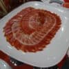 Tranches fines de Pata Negra dressées en éventail